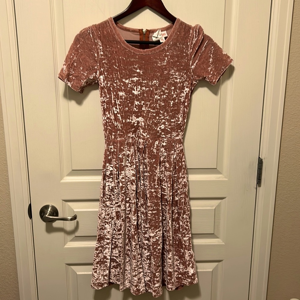 Holiday dresses. Cap sleeve, midi length with pockets.